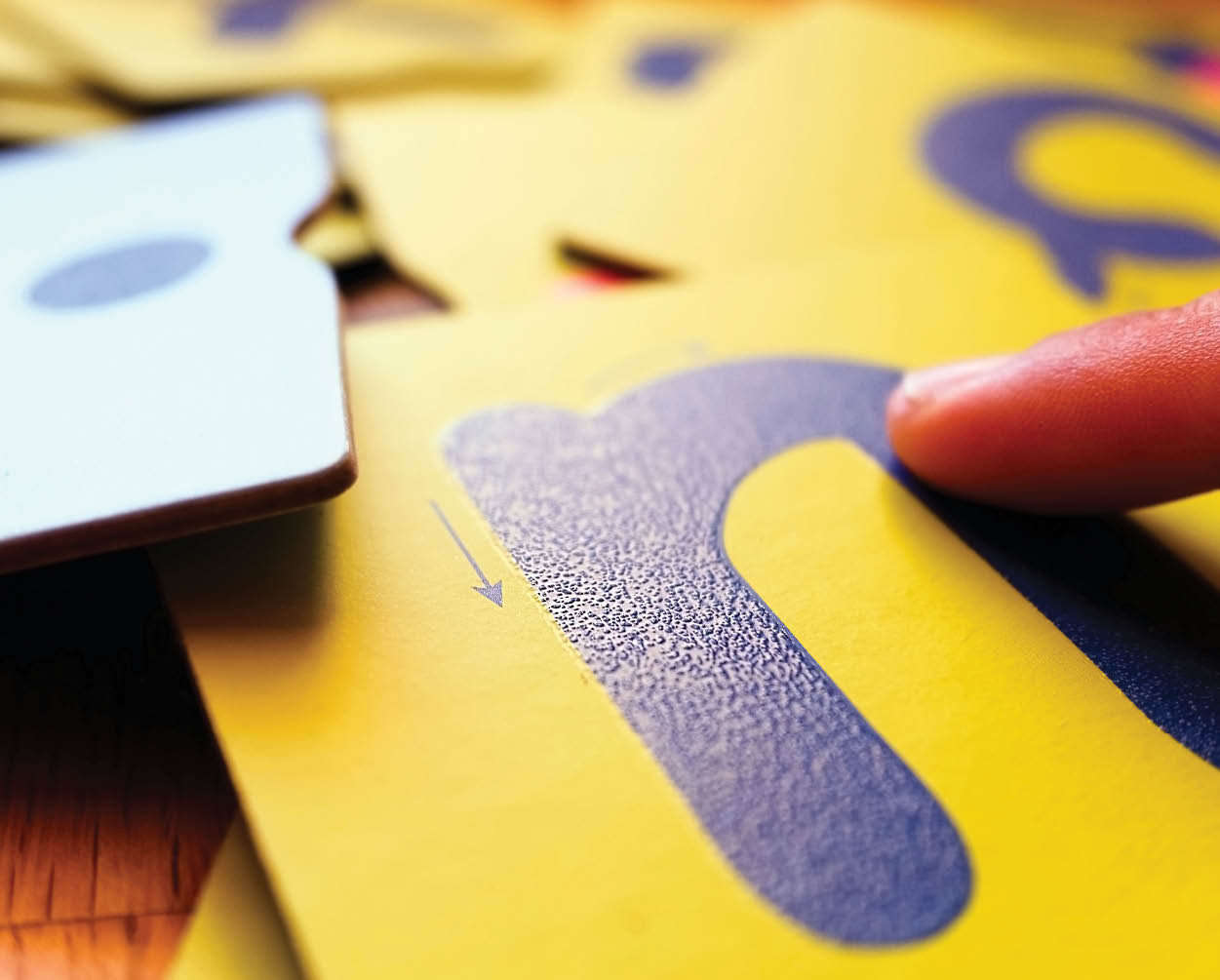 Stack of colored letters to learn the alphabet and letters and develop linguistic skills in a montessori school.