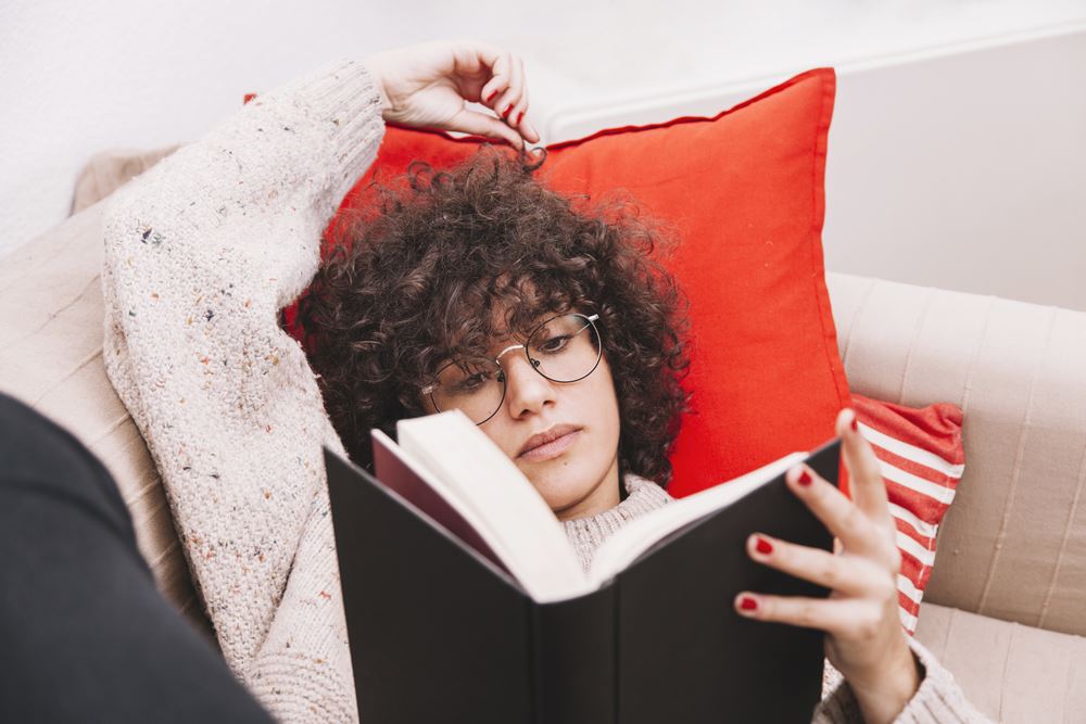 teenager reading sofa