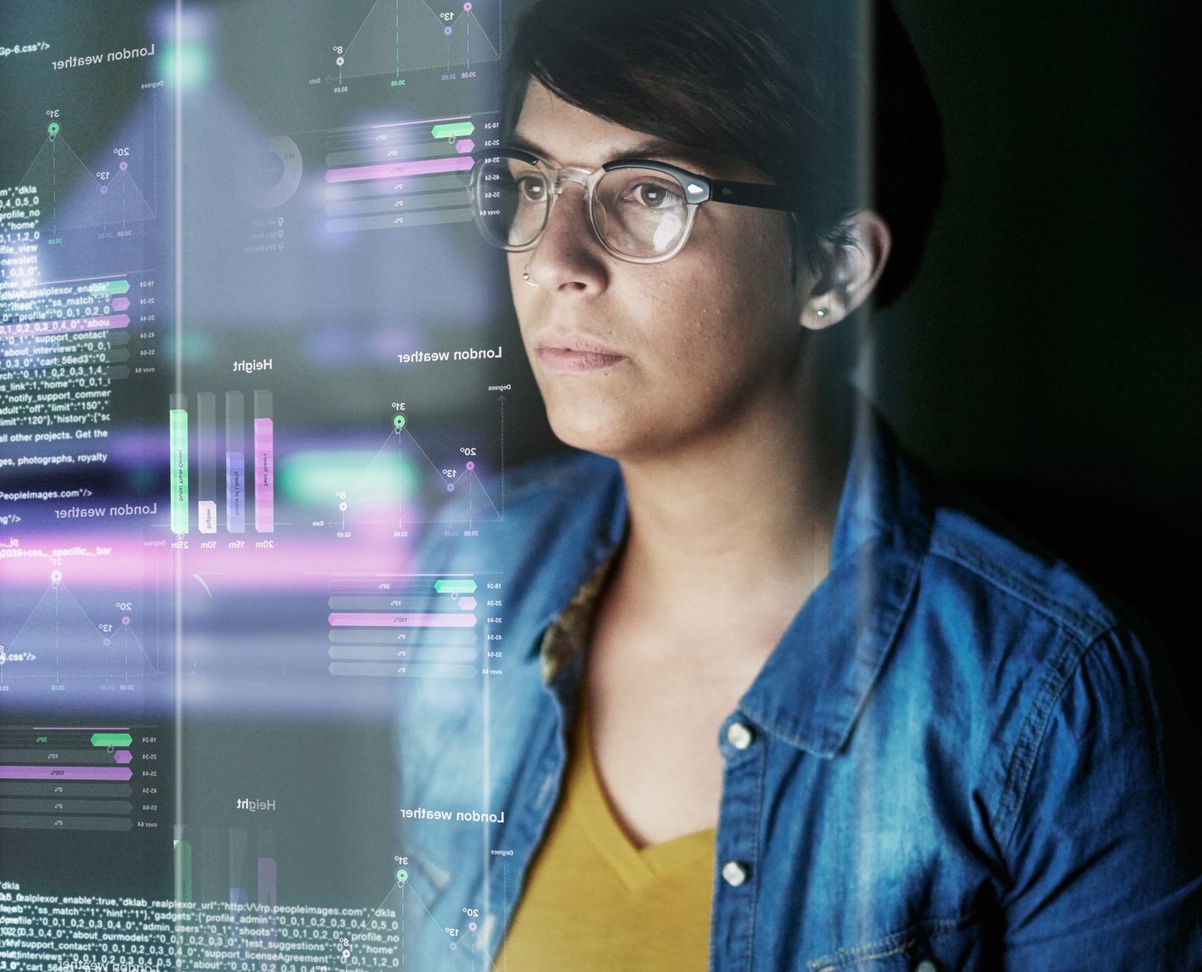 Cropped shot of a young computer programmer looking through data.