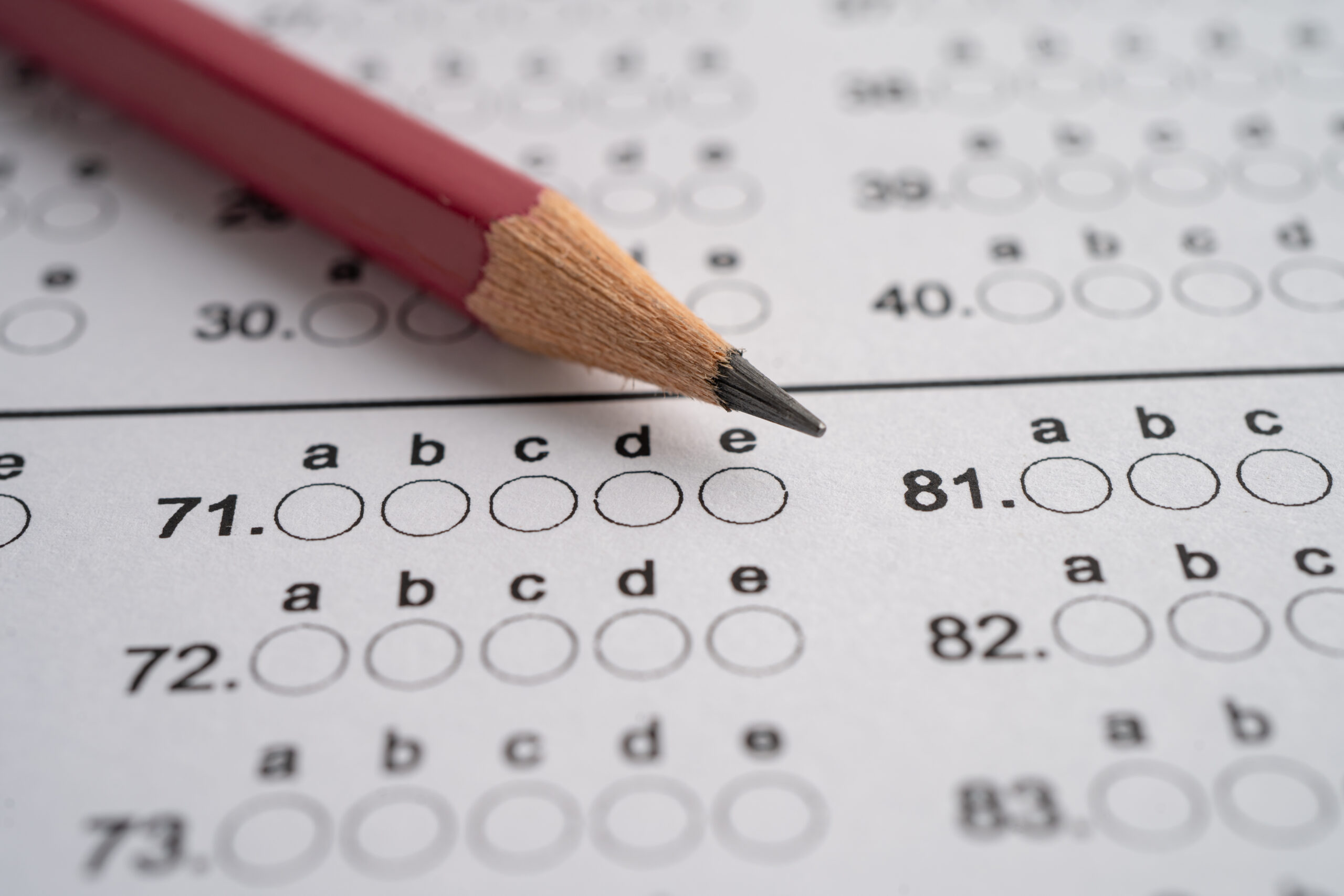 Answer sheets with pencil drawing fill to select choice, educati